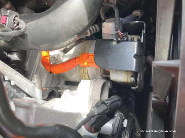 Electric AC compressor.